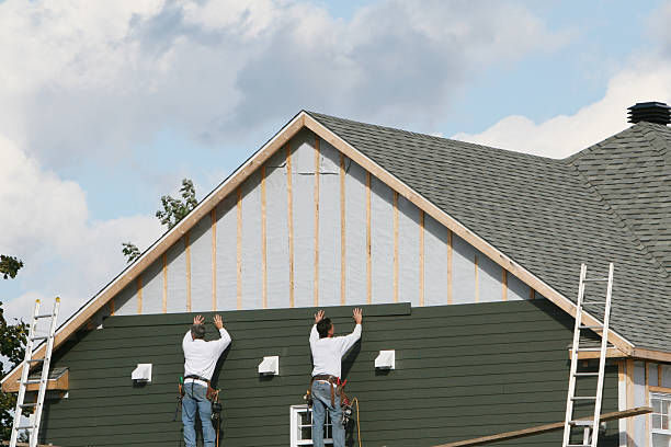 Professional Siding technician working in Dendron, VA